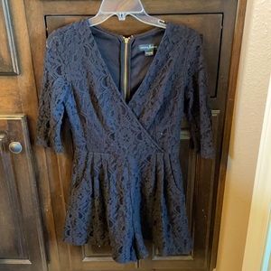 GUESS by Marciano black romper. Size 6.